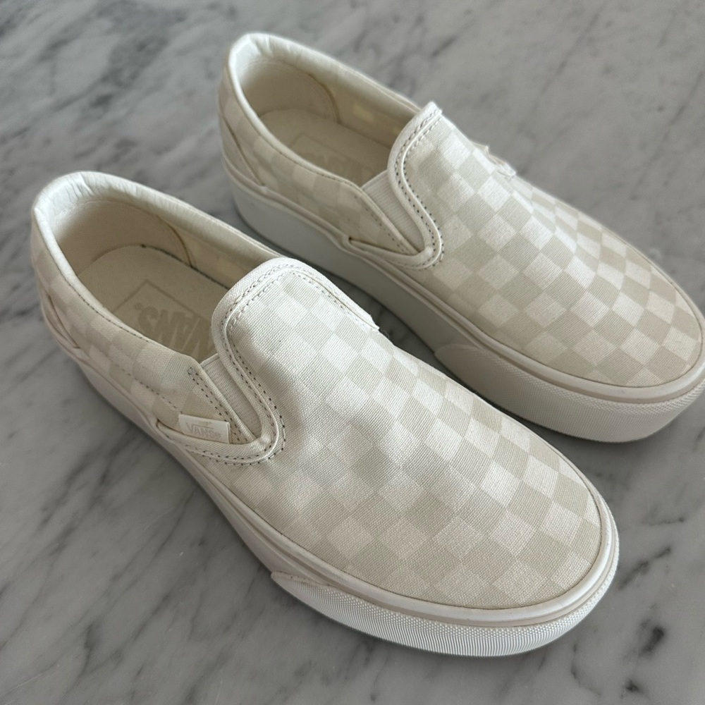 Vans women’s Cream Checkered Slip-On stackform Sneakers.
